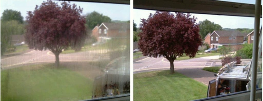 Before and after, the same view from a window: on the left a fogged sealed unit blurring a purple tree and the street, on the right the clear replacement.