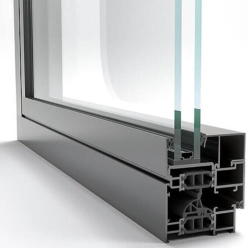 A section through a grey aluminum window frame, cut open along the sill to show the chambers inside it and two panes of sealed glass.