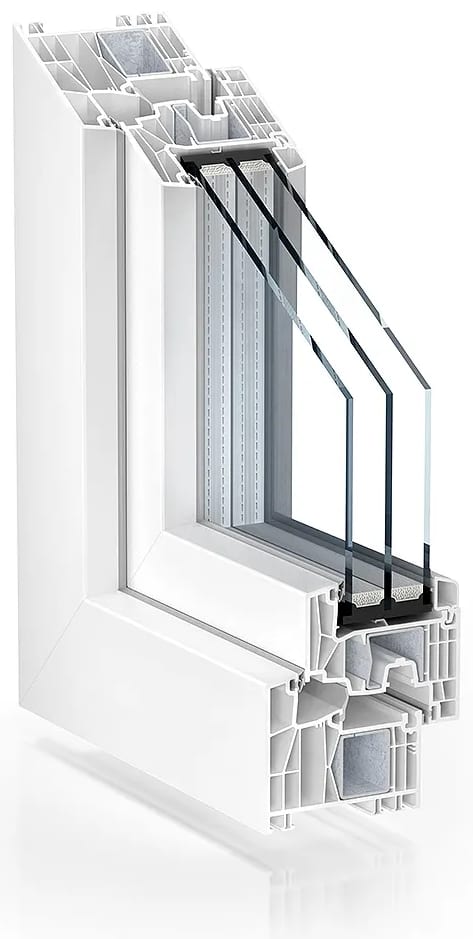 A corner of a white vinyl window cut open: the hollow chambers inside the frame and sash, and three panes of sealed glass.
